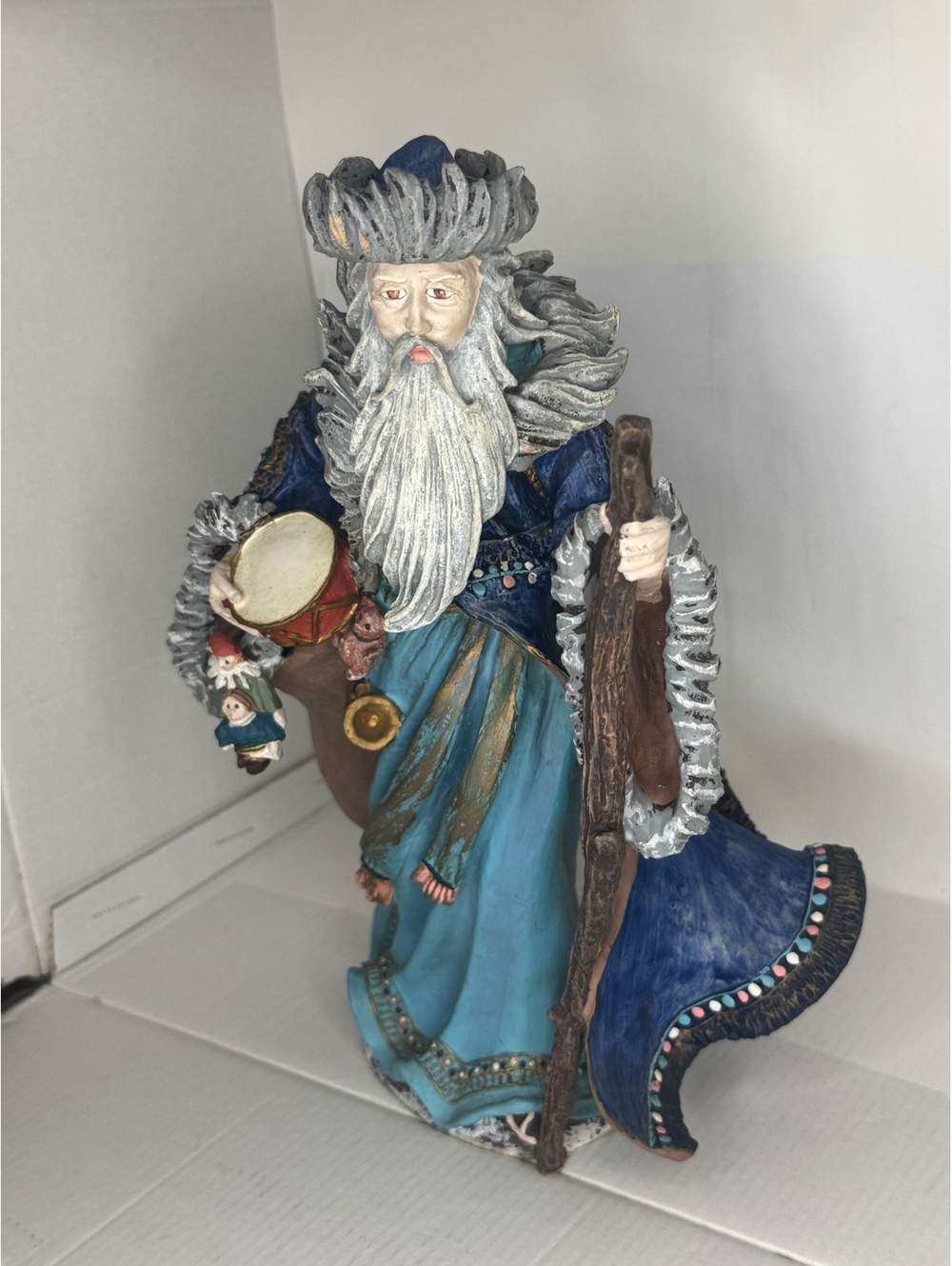 History of Santa blue robe figurine